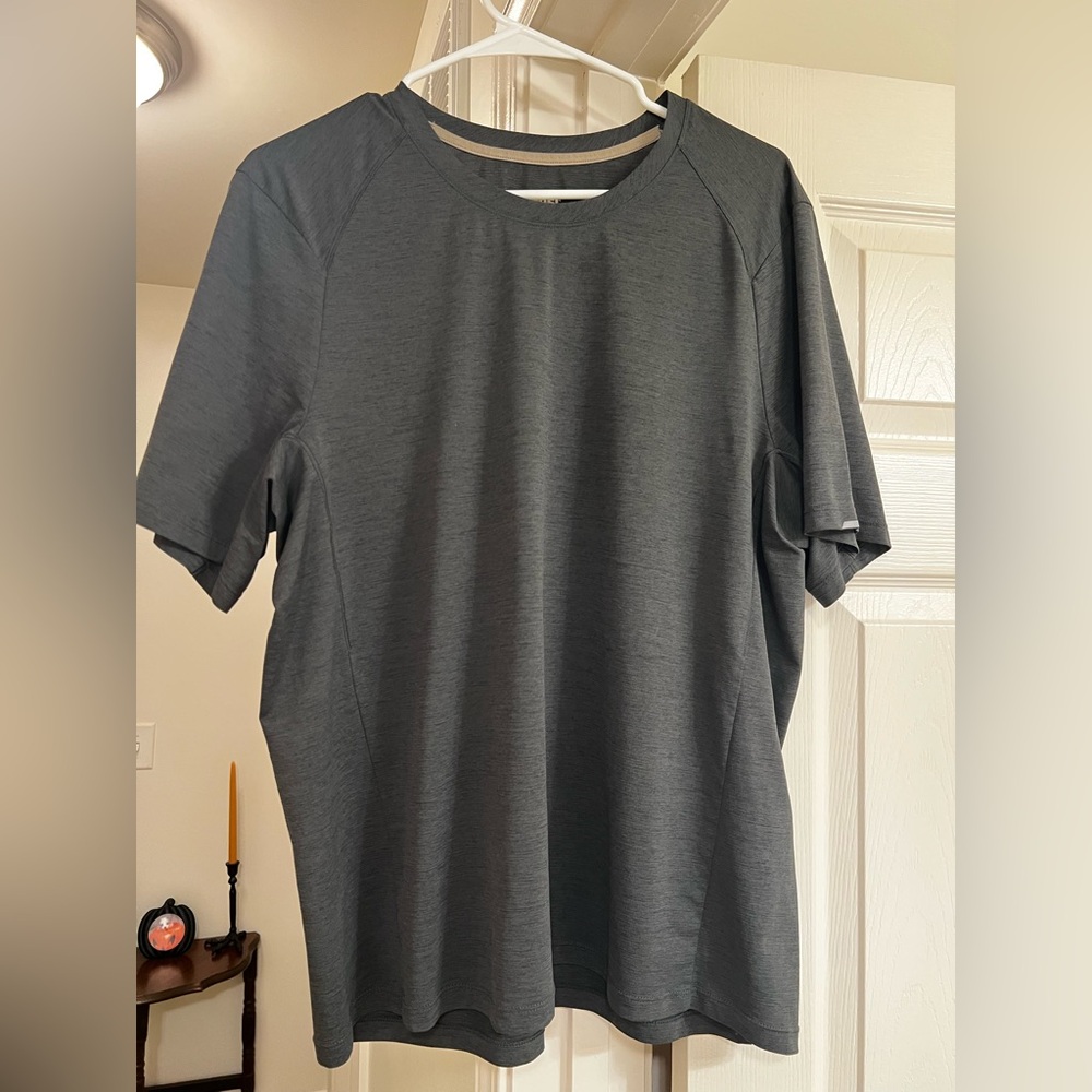 Like new condition: REI Swiftland running T shirt, men’s size large in black.